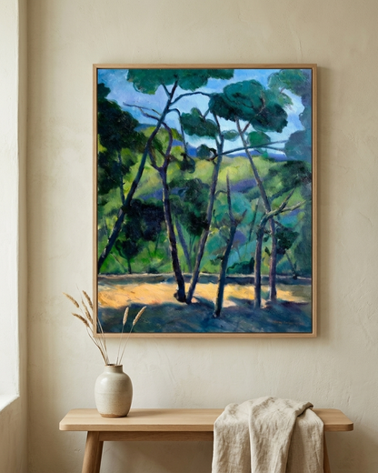 Pines In Blue Light  by Gwen Zhang displayed above a wooden entryway bench in a warm contemporary interior.