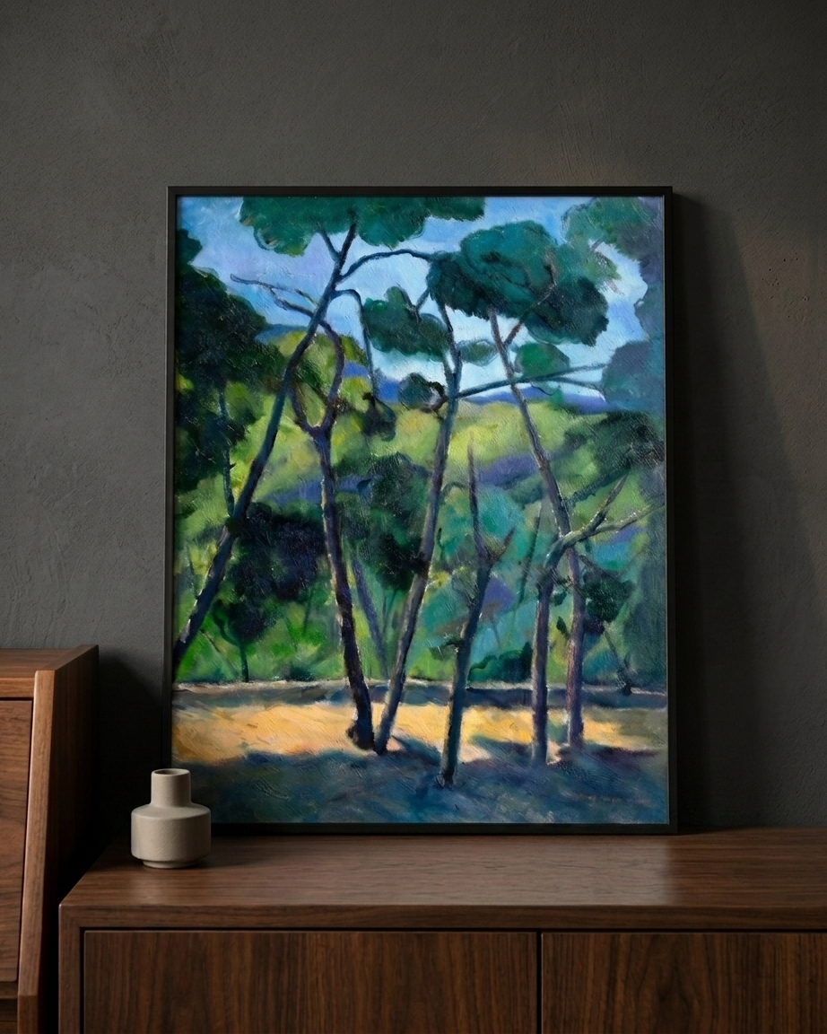 Close-up of Pines In Blue Light canvas print by Gwen Zhang in a black wood frame on a sideboard.

