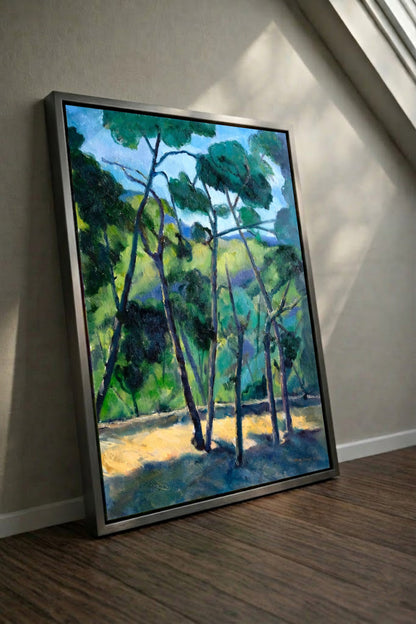 Pines In Blue Light by Gwen Zhang displayed in a champagne wood frame.