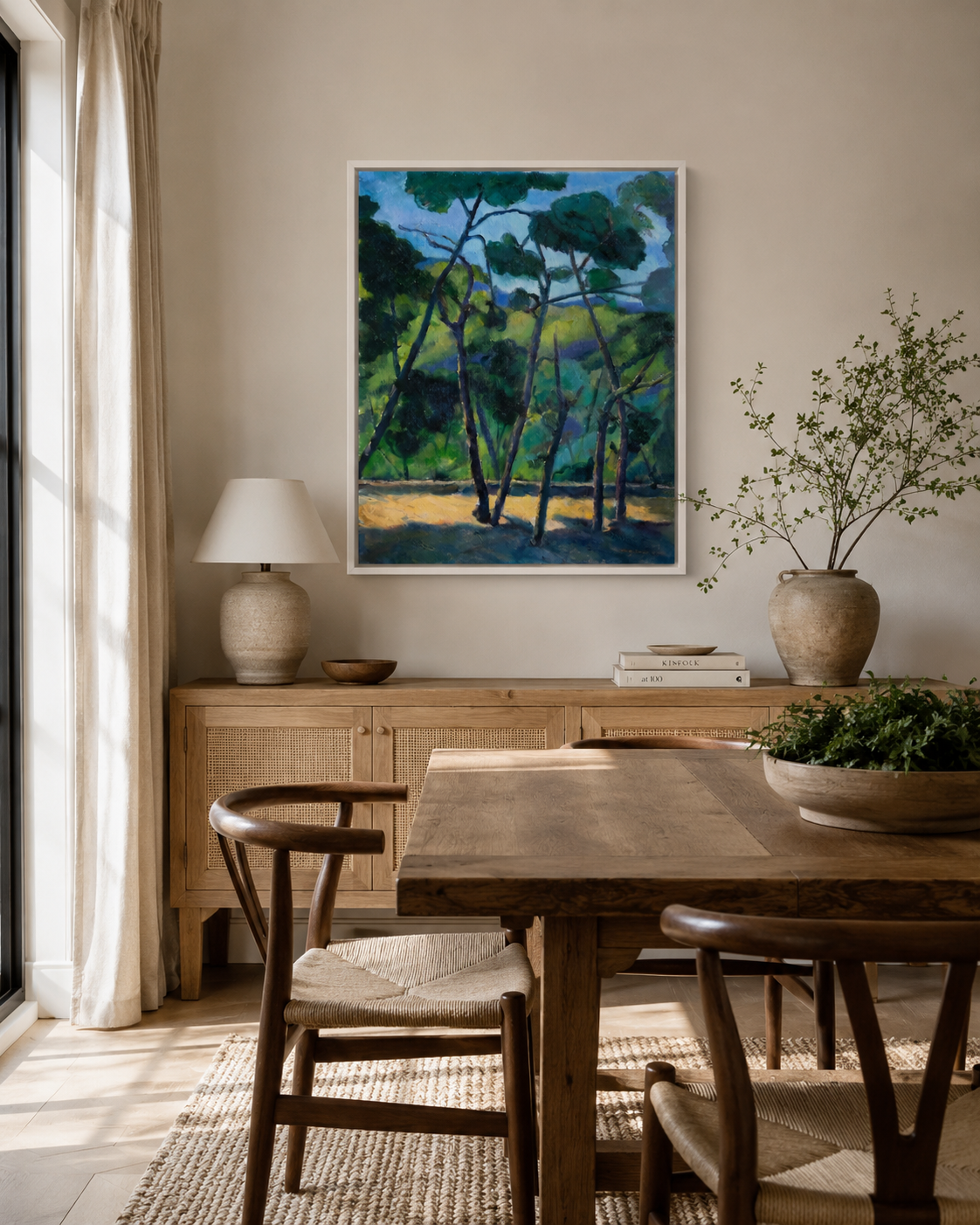 Pines In Blue Light canvas by Gwen Zhang displayed in a white floating frame in a warm contemporary dining room.